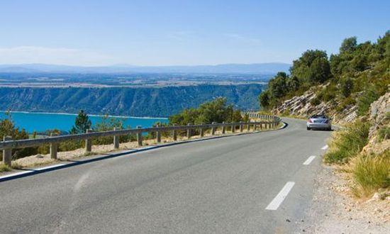 Road D71 alone Verdon river canyon, view on Saint Croix lake and plateau behind. France, Provence..jpg